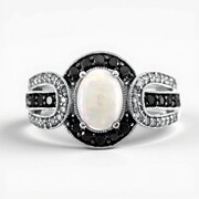 Anillo en oro con Ópalo de Australia (CIRARI)