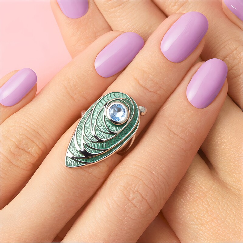 Zilveren ring met een hemel-blauwe topaas (Adela Silber)