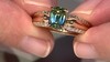 Gouden ring met een meerkleurige saffier (de Melo)