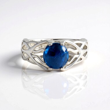 Zilveren ring met een Zwitsers-blauwe topaas (de Melo)