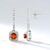 Orecchini in argento con Cianite Arancione