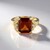 Anello in oro con Granato Essonite