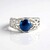 Zilveren ring met een Zwitsers-blauwe topaas (de Melo)