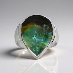 Anello in argento con Legno pietrificato opalizzato (Bali Barong)