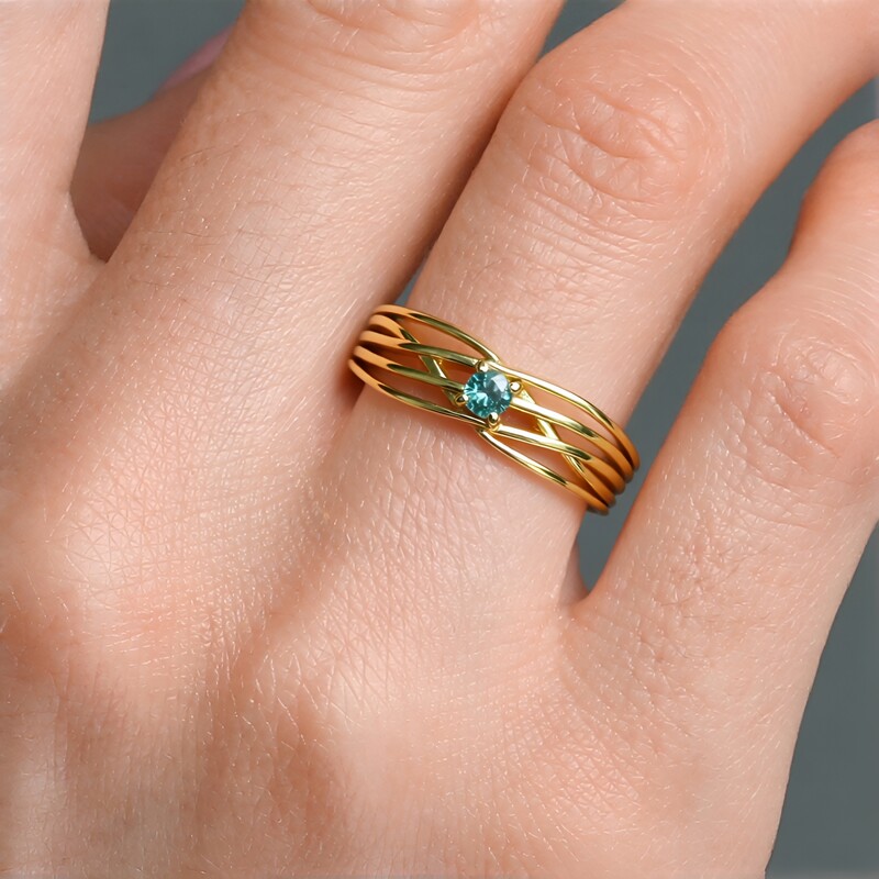 Anillo en plata con Diamante azul I2