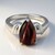 Anello in argento con Occhio di Tigre Rosso