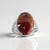 Anello in argento con Legno di Palma Pietrificato (Bali Barong)