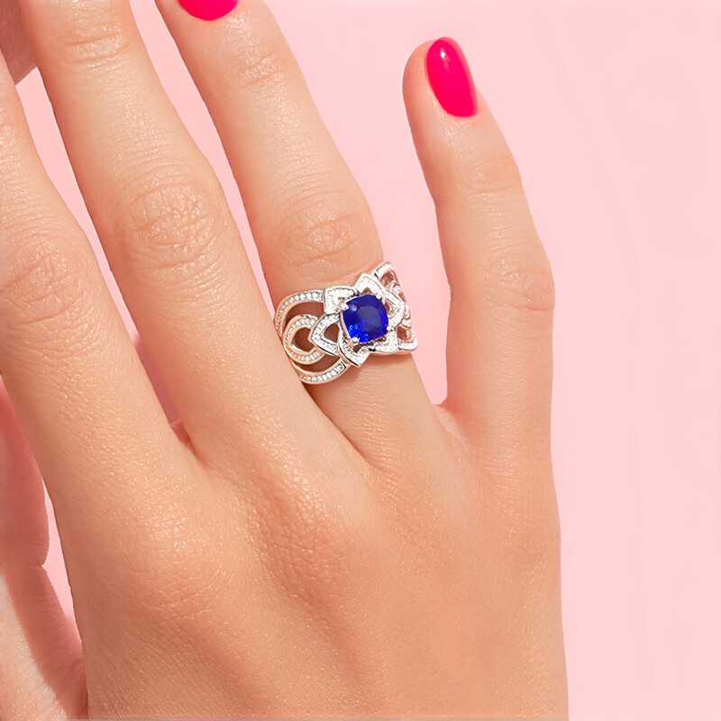 Zilveren ring met een tanzaniet (de Melo Essence)