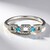 Anello in argento con Apatite Blu Neon e Zaffiro Bianco