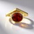 Anello in oro con Granato Essonite