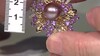 Zilveren broche met een paarse Ming parel (TPC)