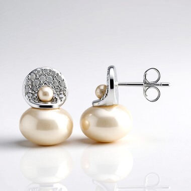 Boucles d'oreilles en argent et Perle blanche de culture d'eau douce (Michelle Albala)