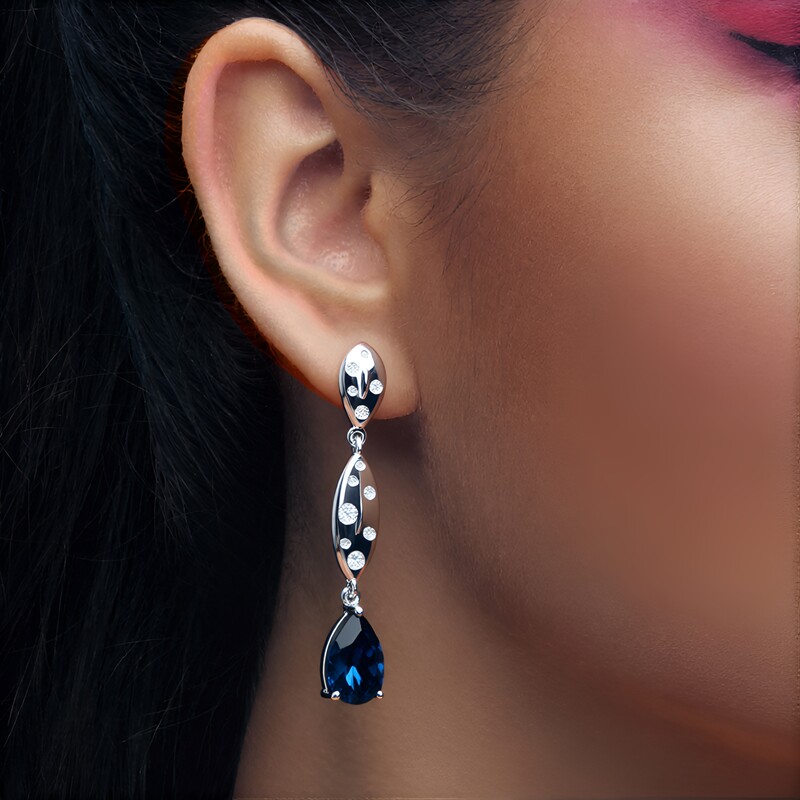Kolczyki ze srebra rodowanego - Topaz niebieski London Blue (de Melo Essence)