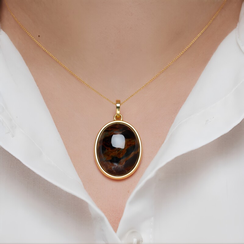 Zilveren hanger met een Gouden Pietersiet