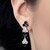 Zilveren oorbellen met zwarte spinelstenen