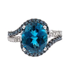 Gouden ring met een Londen-blauwe topaas