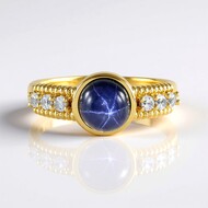 Zilveren ring met een blauwe ster saffier